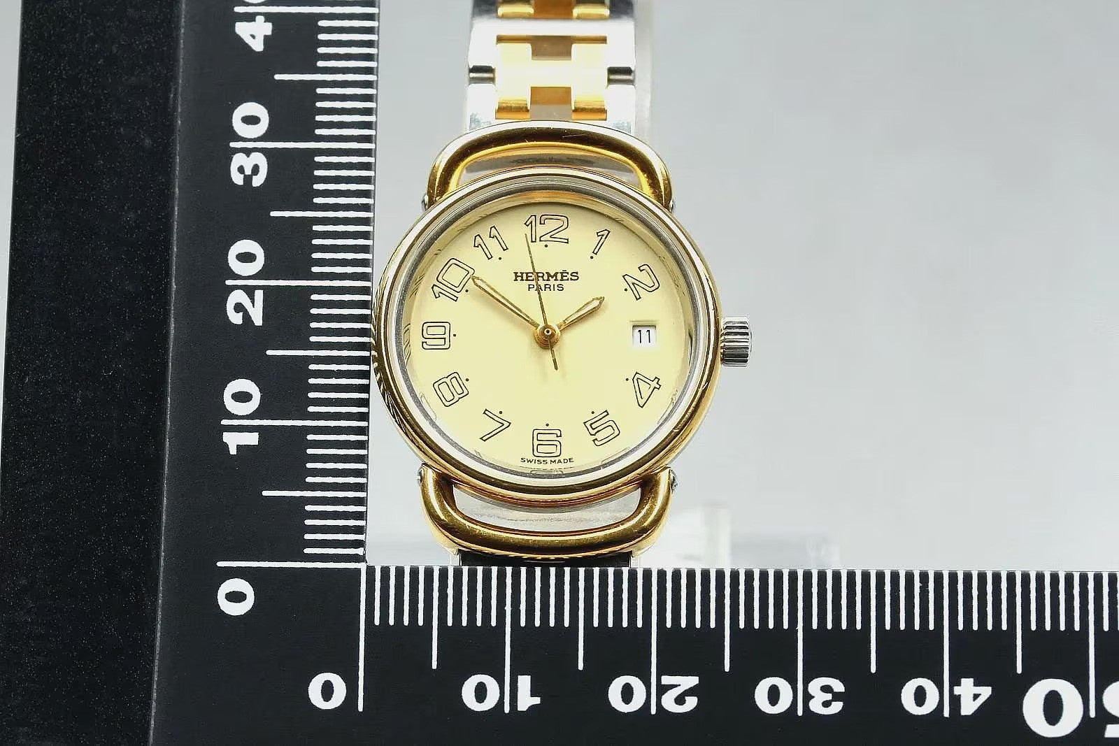 Hermès Pullman Wristwatch - Gold, Stainless Steel