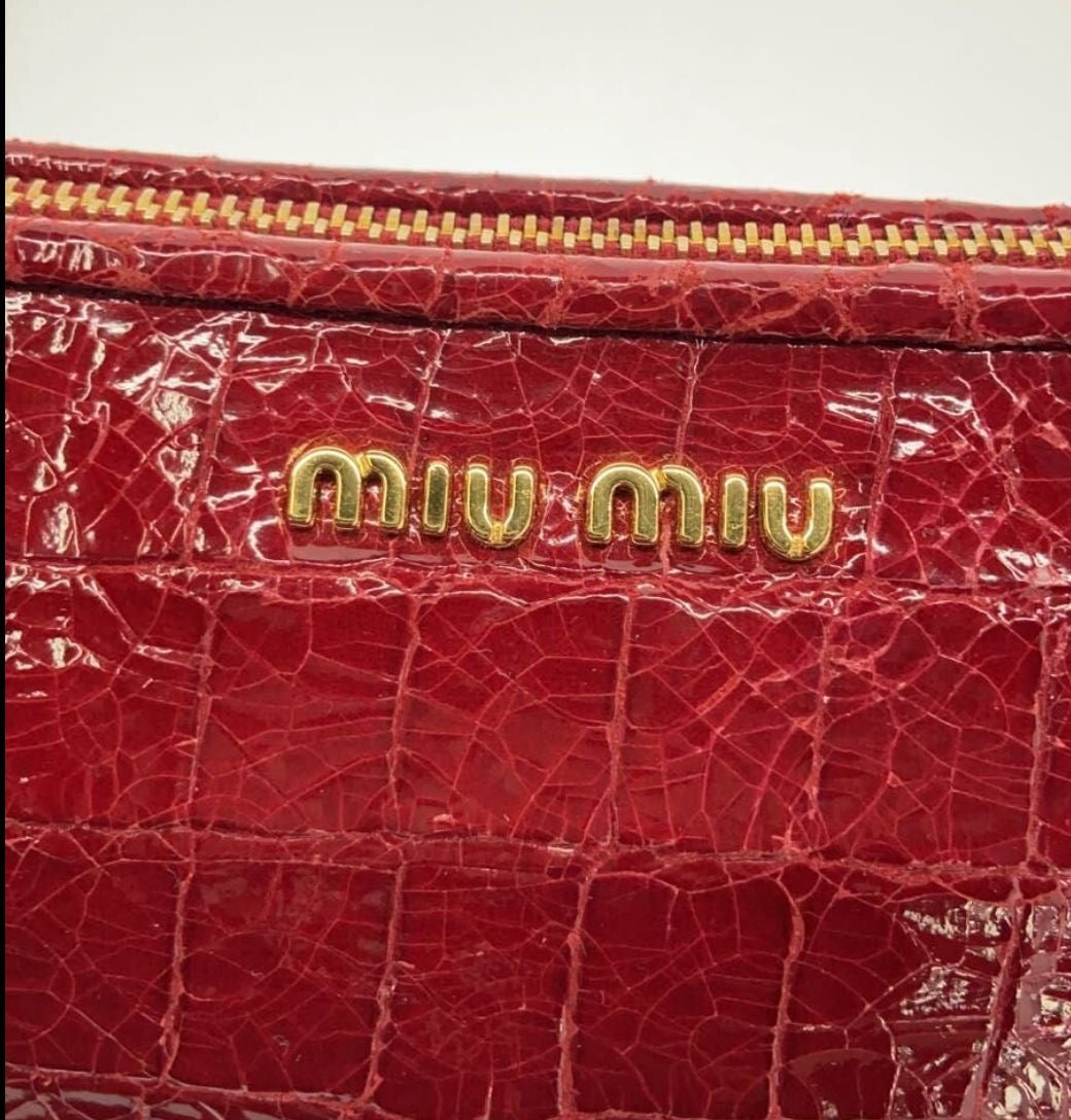 Miu Miu red clutch bag