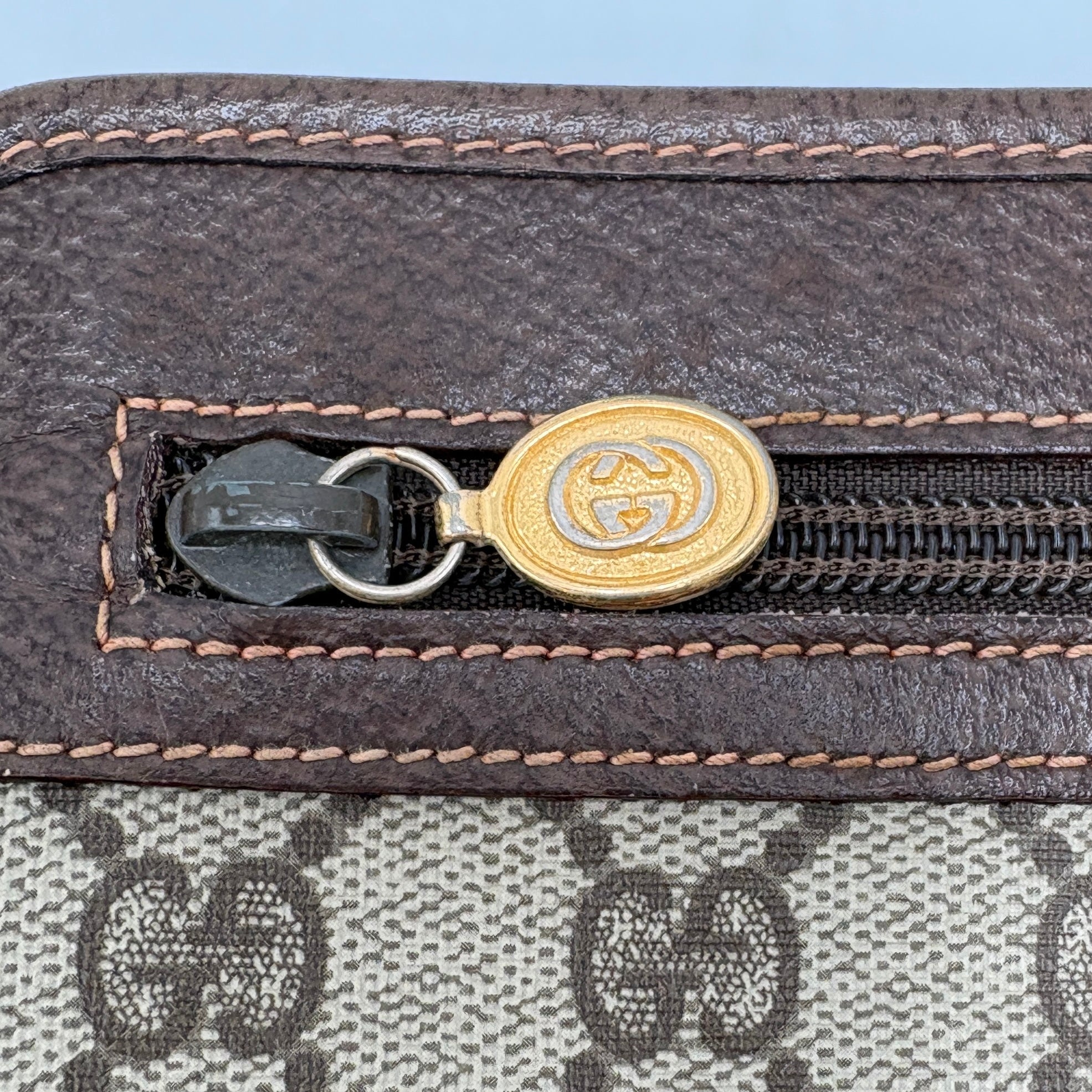 Gucci GG Plus Clutch Bag