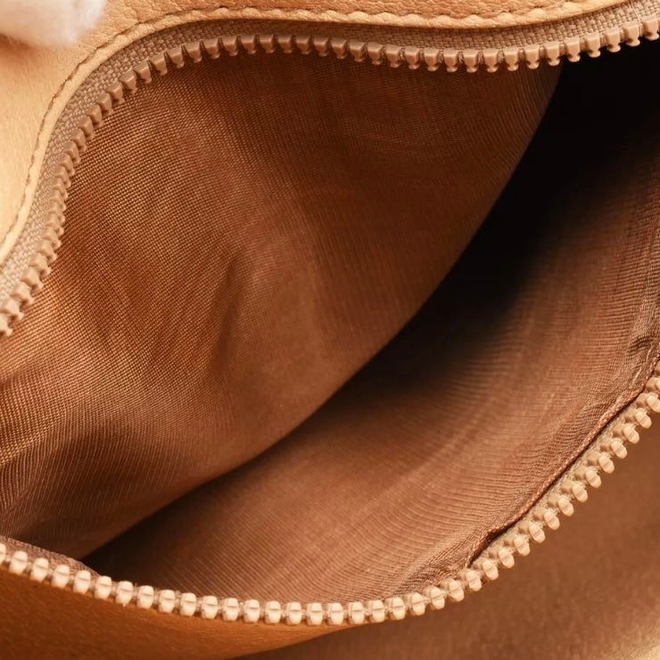 Macadam vintage clutch