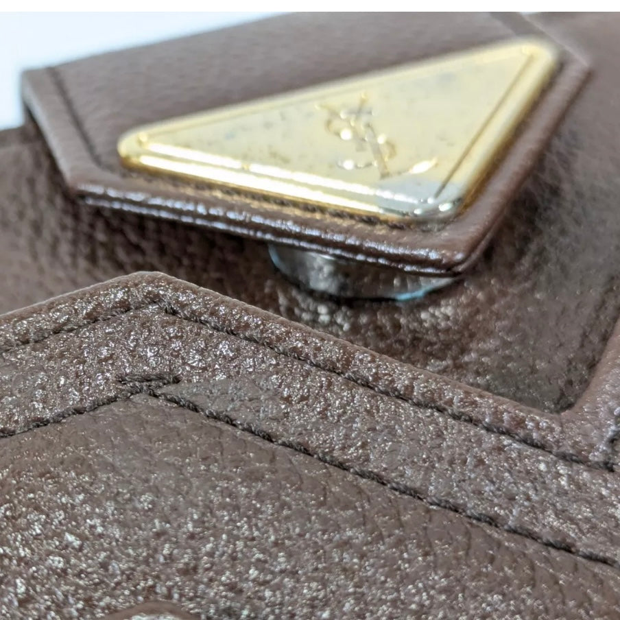 Yves Saint Laurent clutch leather