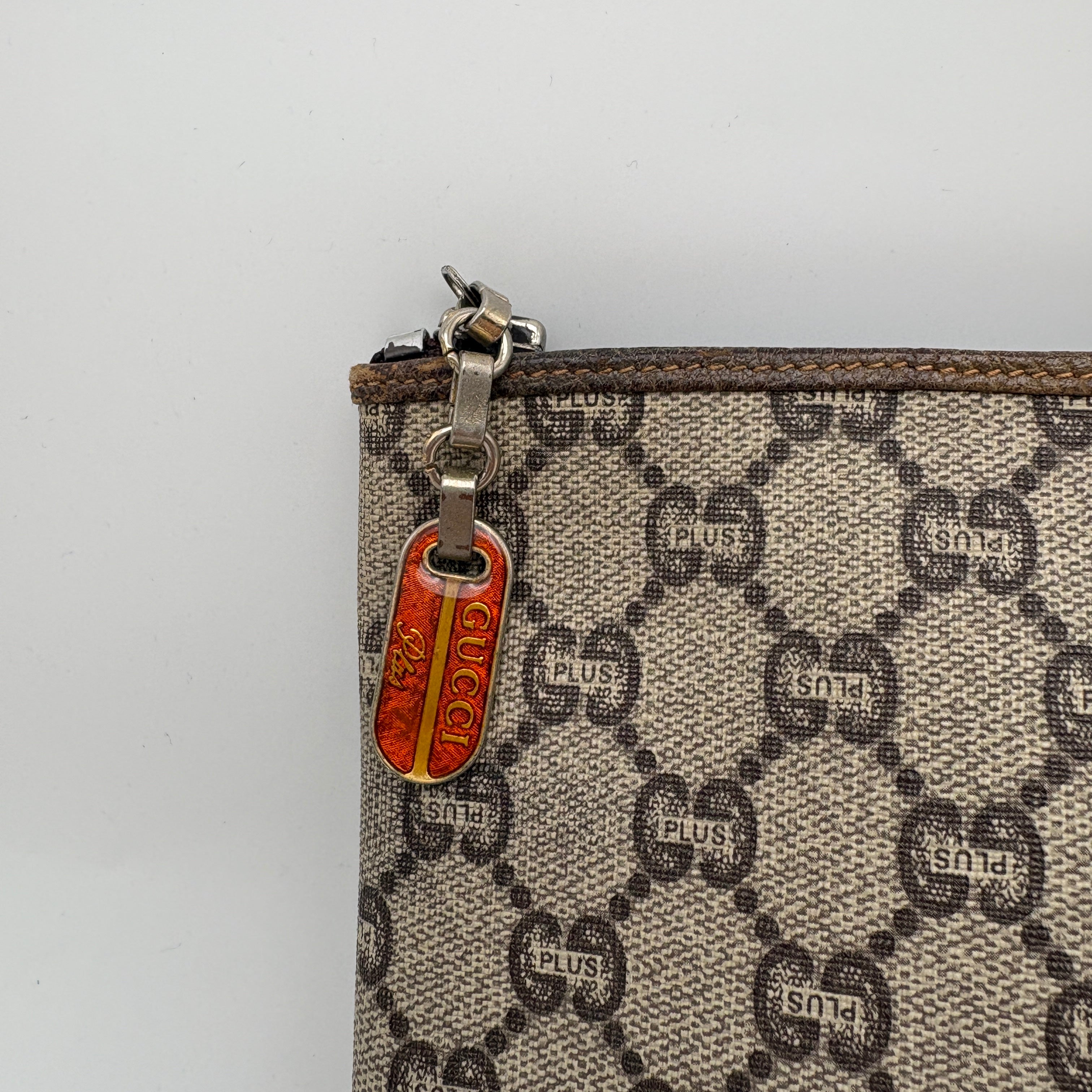 Gucci GG Plus clutch