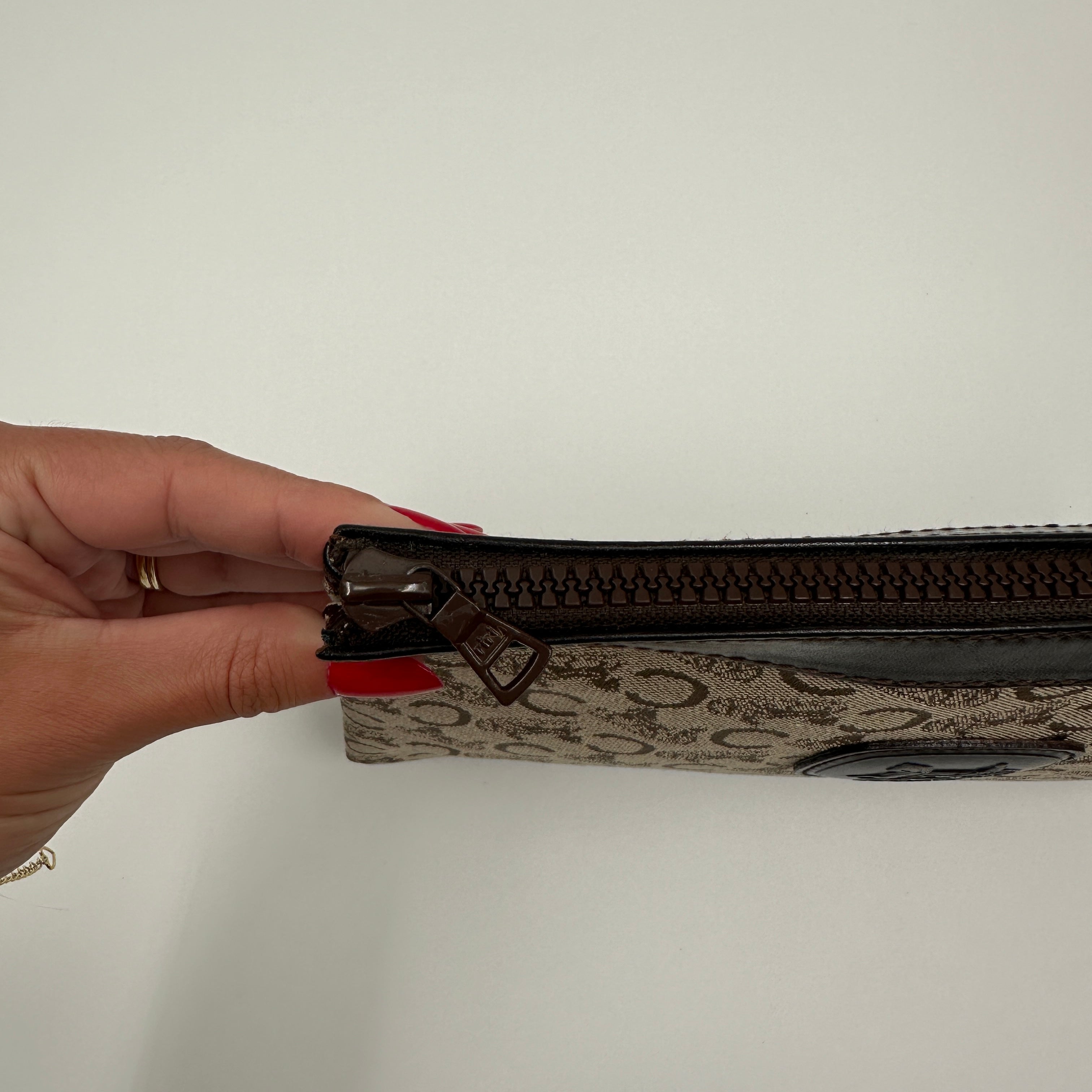 C Horse Carriage Clutch Bag