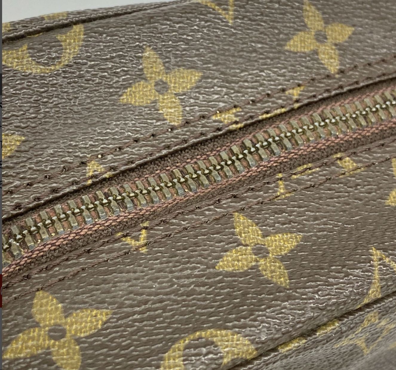 Louis Vuitton Trousse Toilette 28 Monogram Clutch - Brown, Leather