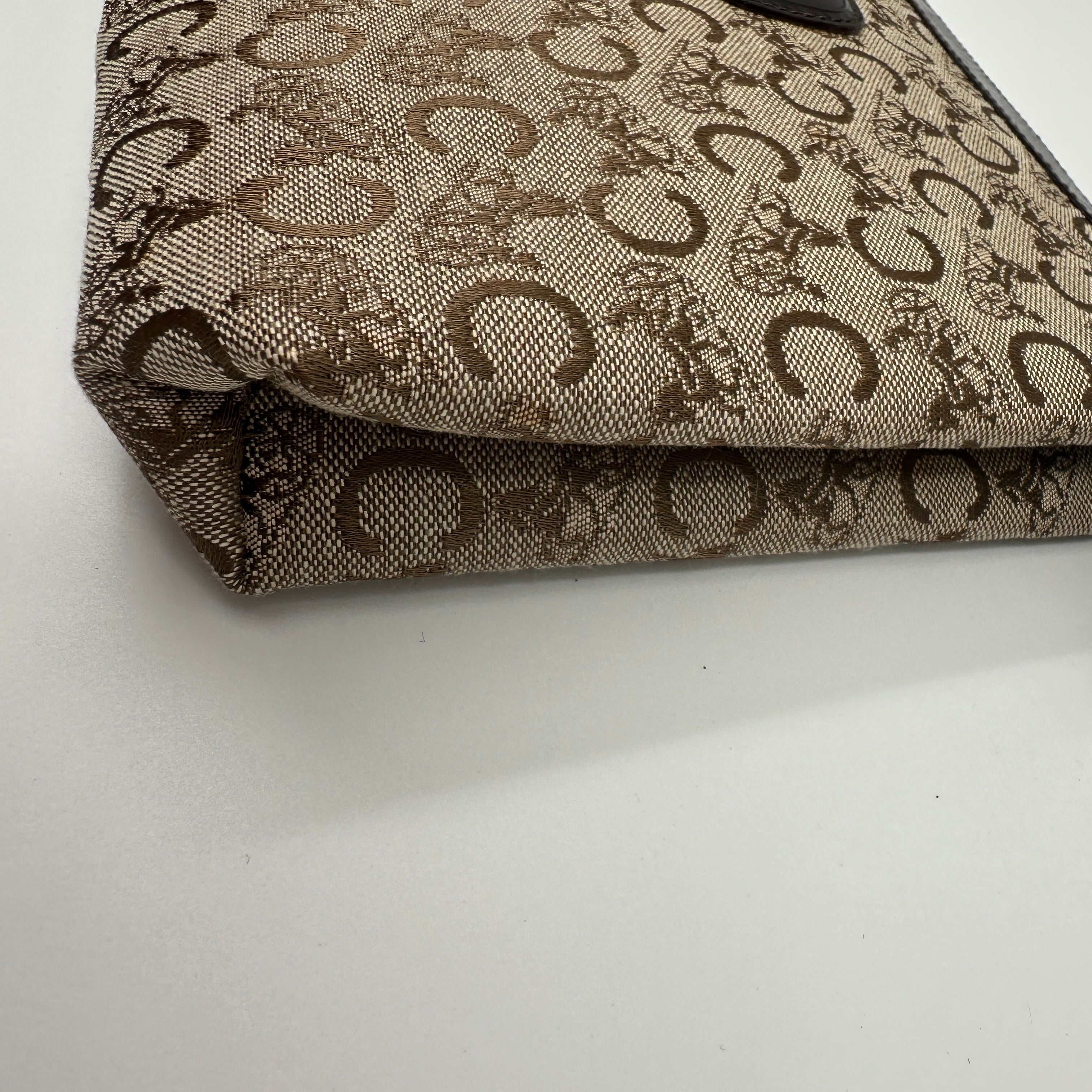 C Horse Carriage Clutch Bag