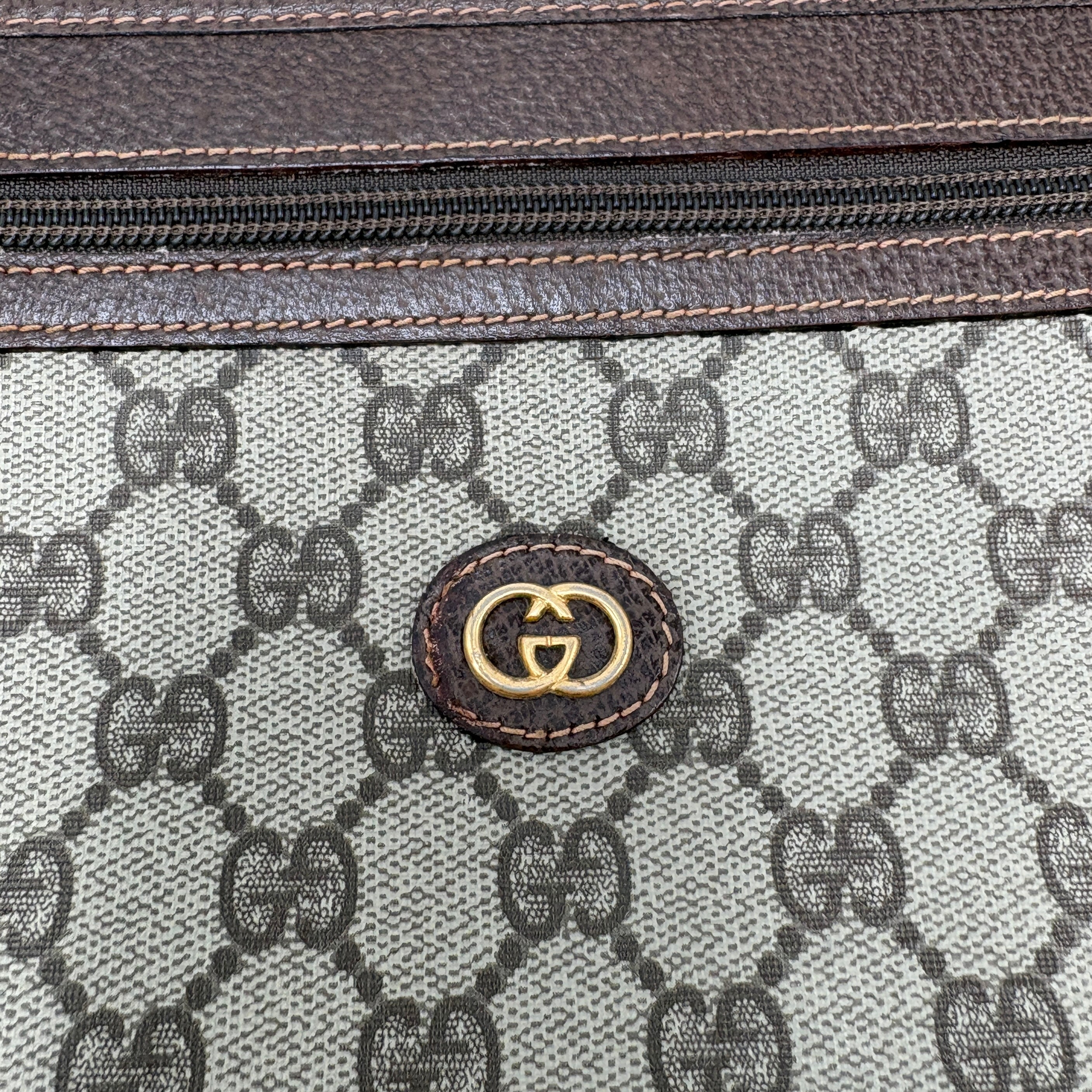 Gucci GG Plus Clutch Bag
