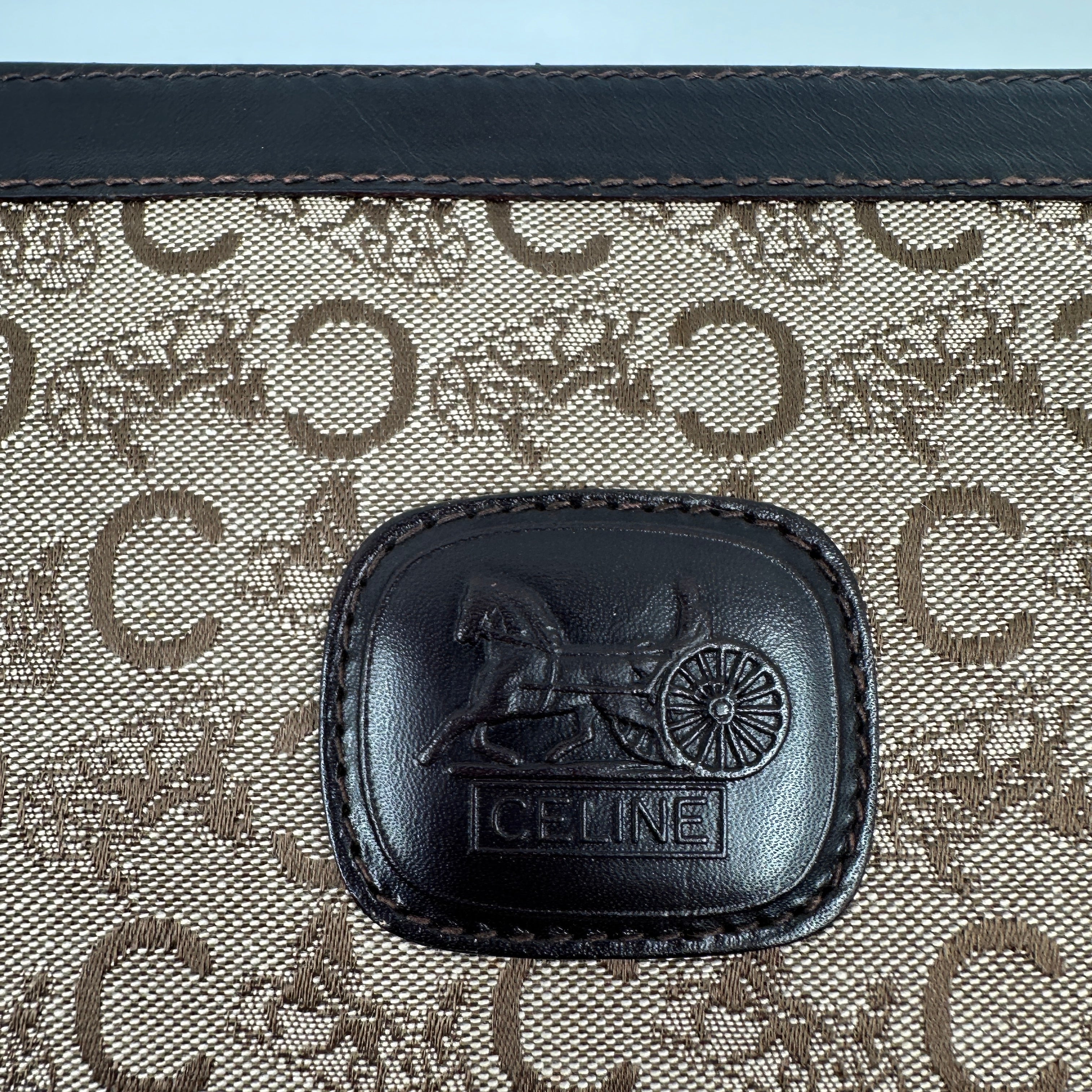 C Horse Carriage Clutch Bag
