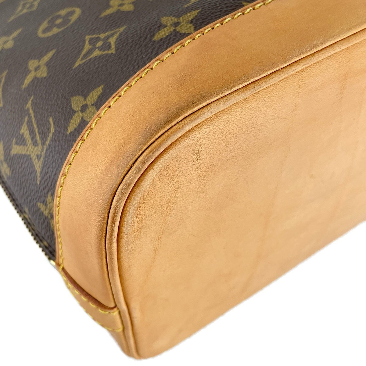 Louis Vuitton Monogram Alma Handbag - Brown, Coated Canvas