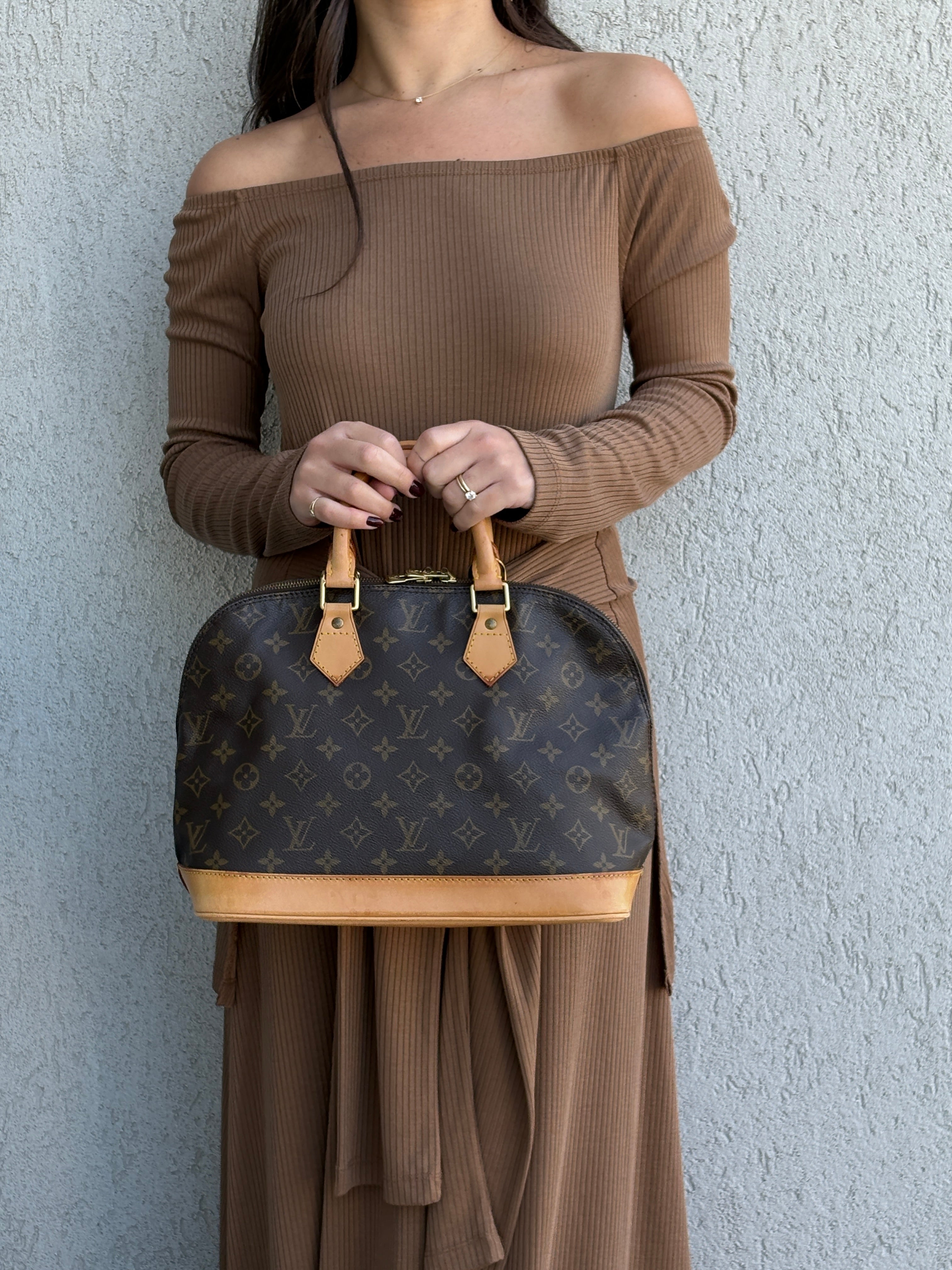 Louis Vuitton Alma hand bag