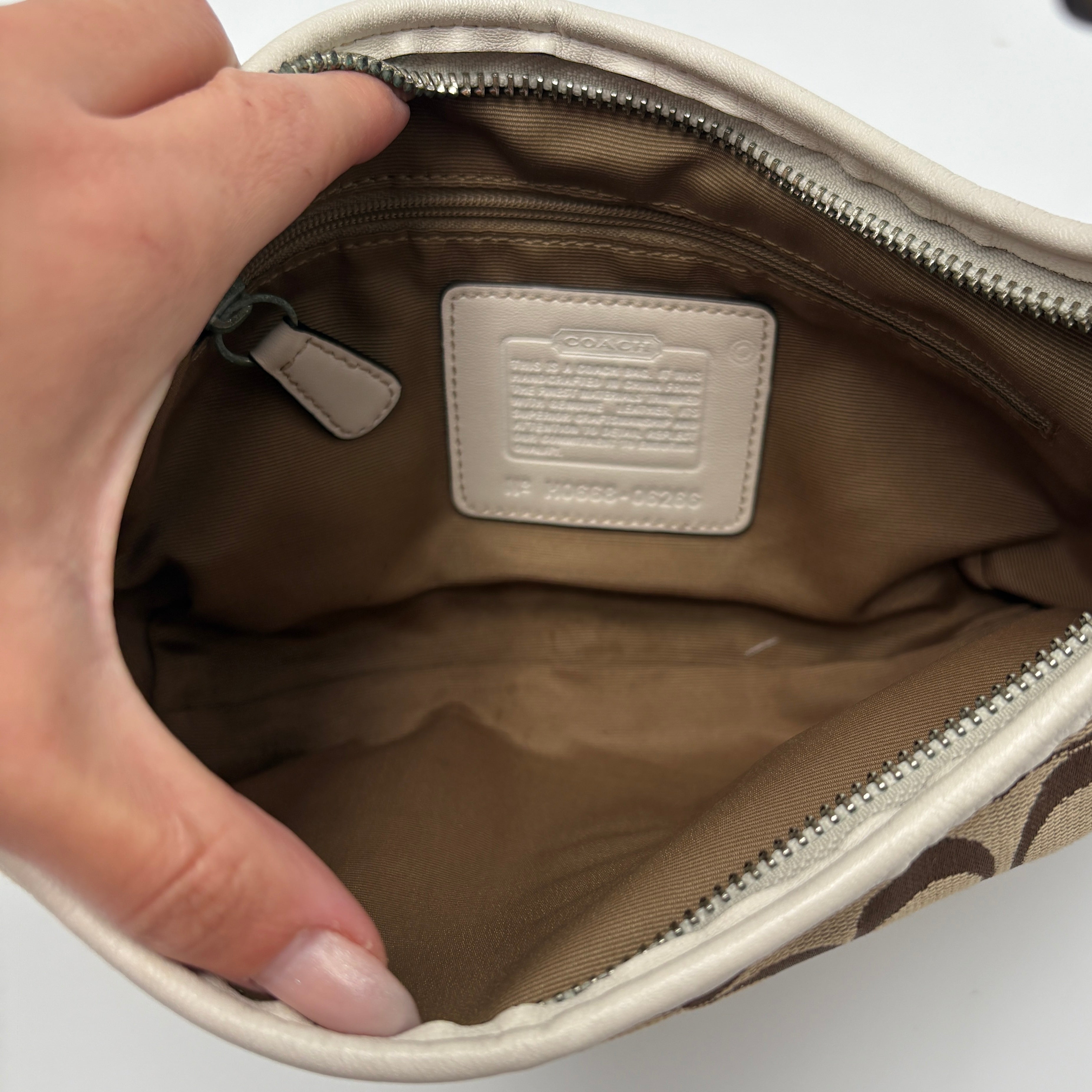 Coach Signature white hobo bag