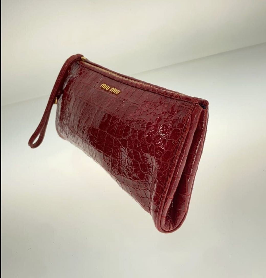 Miu Miu red clutch bag