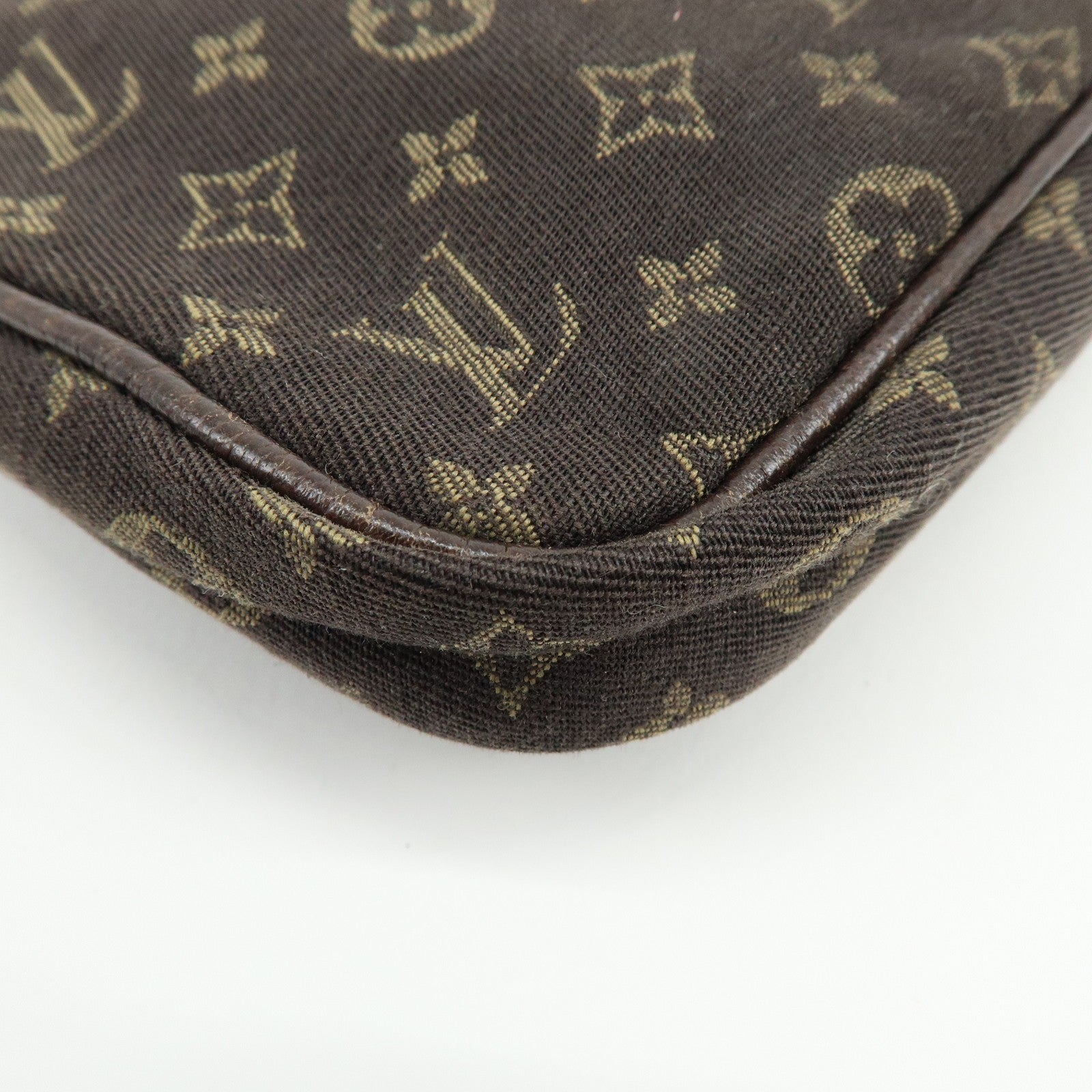 Louis Vuitton Monogram Mini Lin Pouch - Ebene, Canvas
