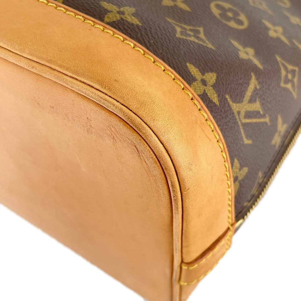 Louis Vuitton Monogram Alma Handbag - Brown, Coated Canvas