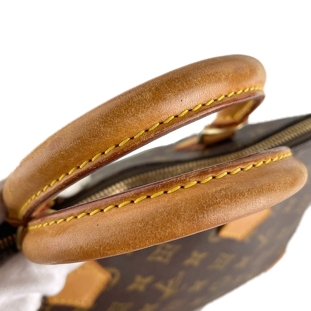 Louis Vuitton Monogram Alma Handbag - Brown, Coated Canvas