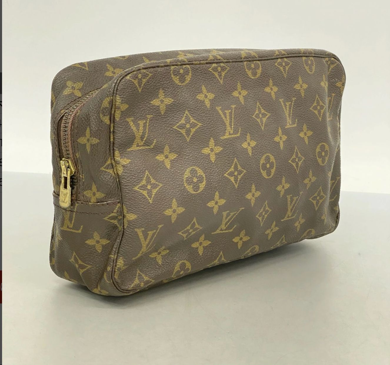 Louis Vuitton Trousse Toilette 28 Monogram Clutch - Brown, Leather