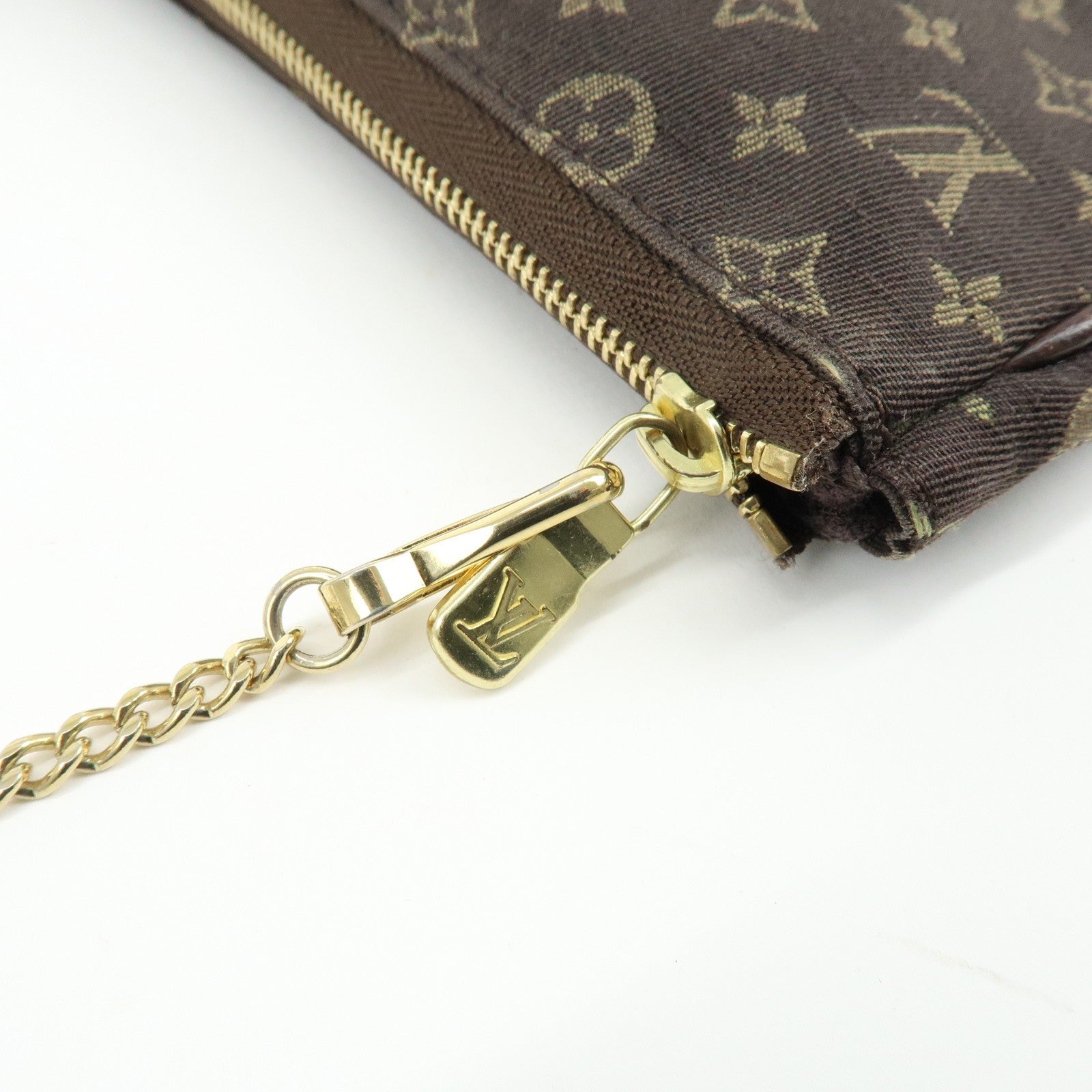 Louis Vuitton Monogram Mini Lin Pouch - Ebene, Canvas