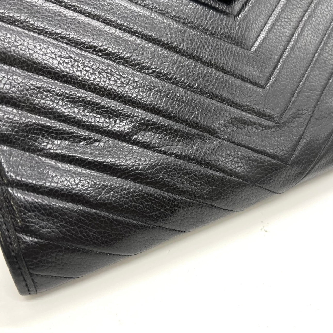 Saint Laurent black leather clutch
