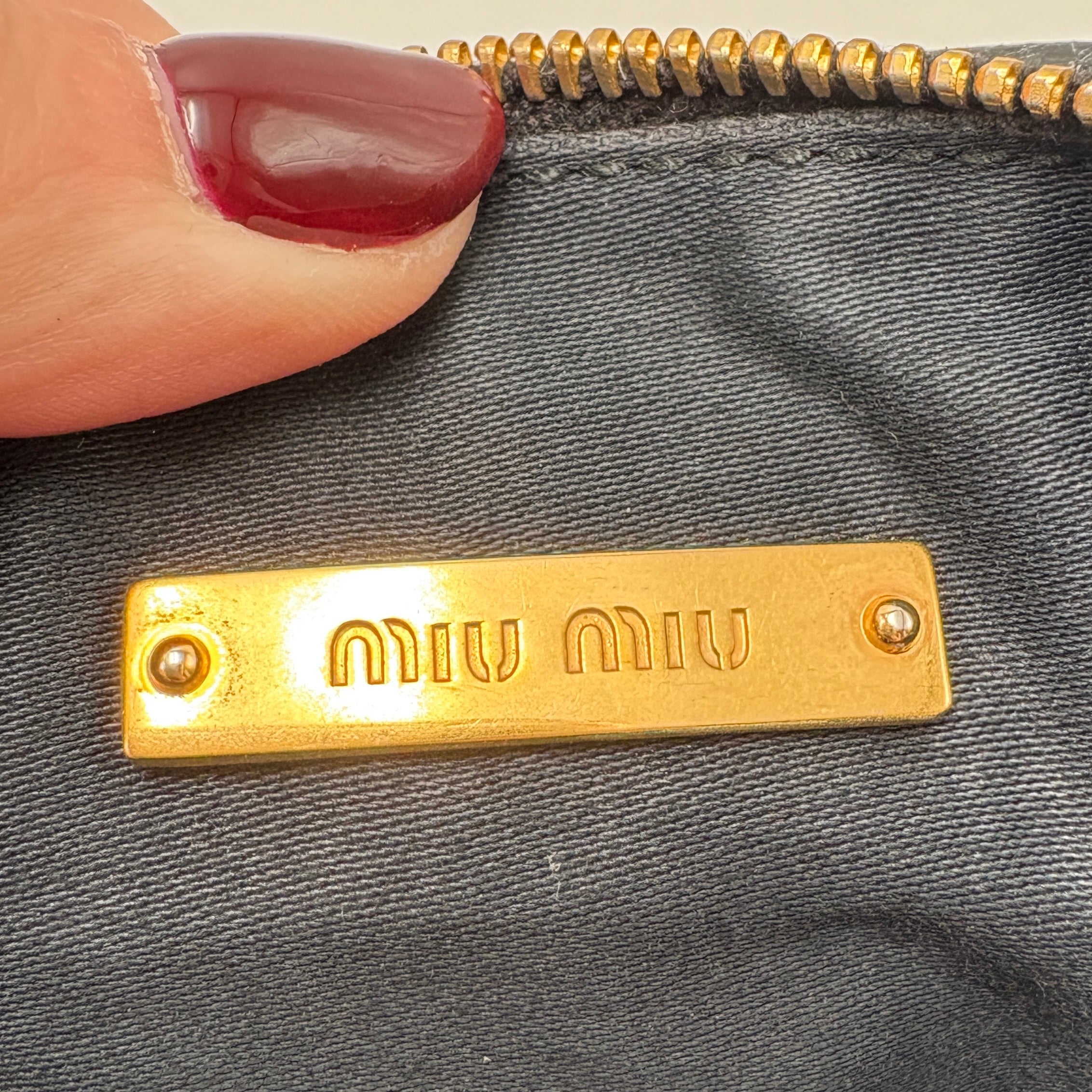 MIU MIU black clutch