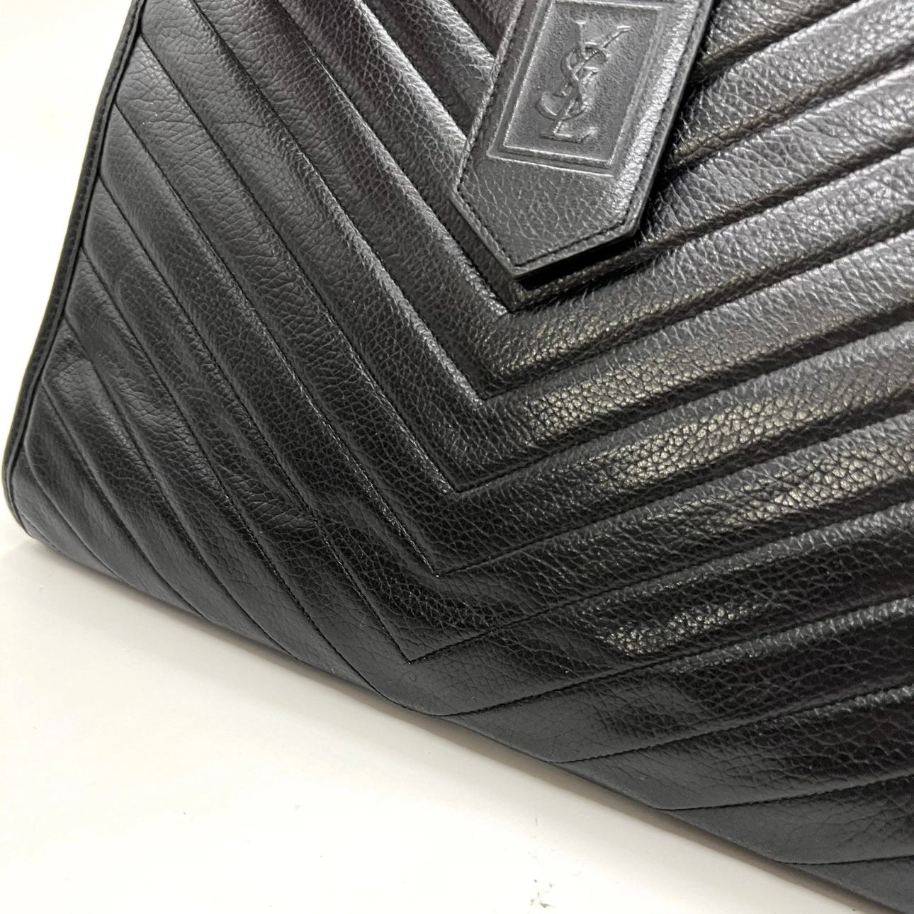 Saint Laurent black leather clutch