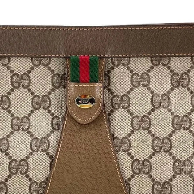 SHERRY LINE PVC LEATHER CLUTCH