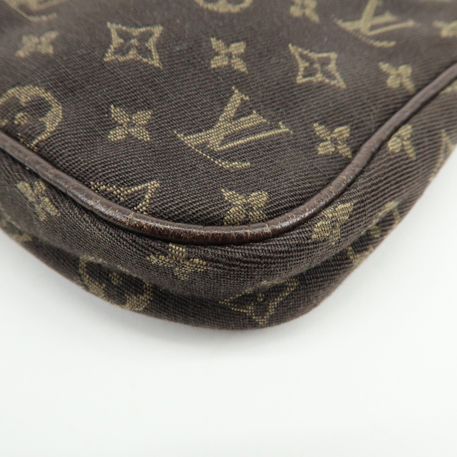 Louis Vuitton Monogram Mini Lin Pouch - Ebene, Canvas